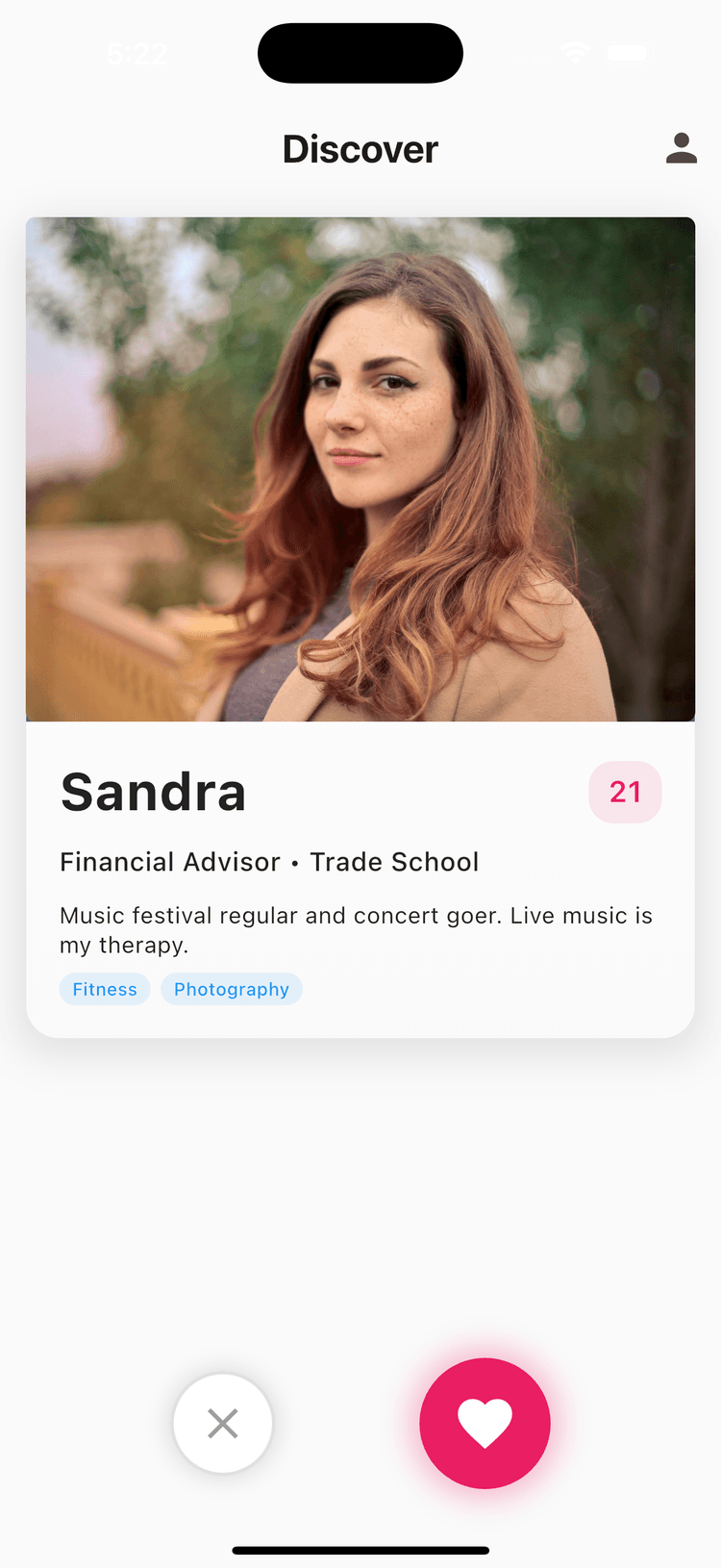 Yuti dating app showing Sandra's profile with photos and like/pass buttons